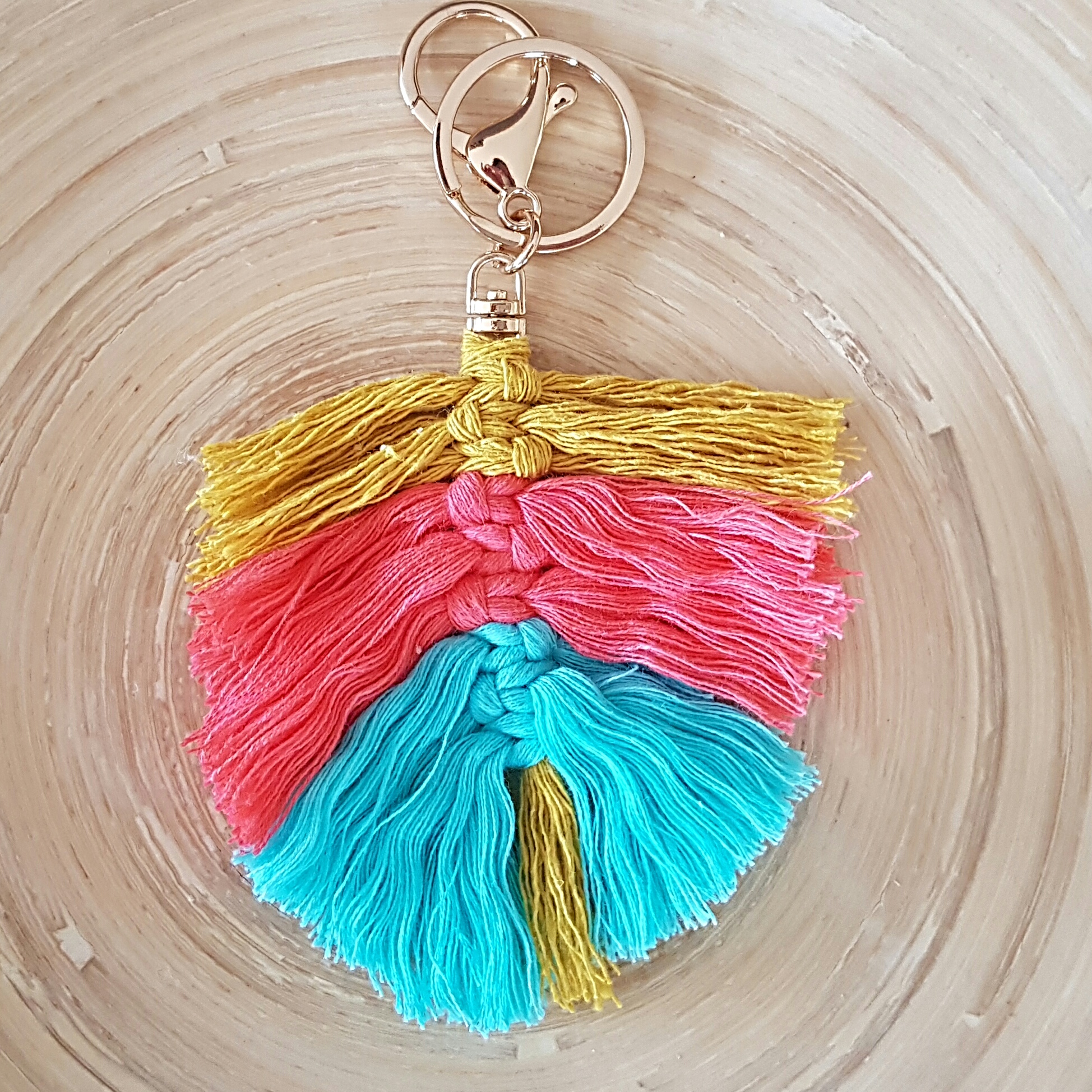 Mustard Coral and Teal Feather keyring Pretty Unique